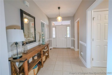 Welcome to this charming ranch home in the highly sought-after on Gates Four Golf and Country Club in North Carolina - for sale on GolfHomes.com, golf home, golf lot