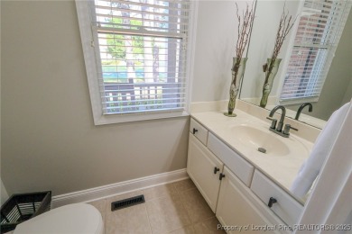 Welcome to this charming ranch home in the highly sought-after on Gates Four Golf and Country Club in North Carolina - for sale on GolfHomes.com, golf home, golf lot