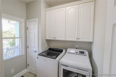 Welcome to this charming ranch home in the highly sought-after on Gates Four Golf and Country Club in North Carolina - for sale on GolfHomes.com, golf home, golf lot