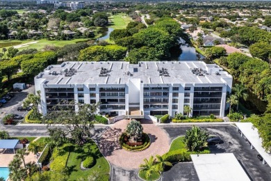 Breathtaking water views from this neutral highly sought after on Boca West Golf and Country Club in Florida - for sale on GolfHomes.com, golf home, golf lot