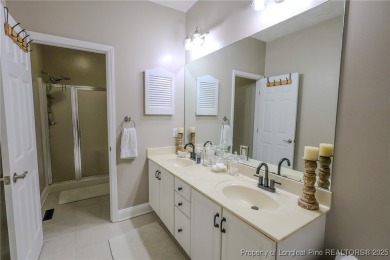 Welcome to this charming ranch home in the highly sought-after on Gates Four Golf and Country Club in North Carolina - for sale on GolfHomes.com, golf home, golf lot