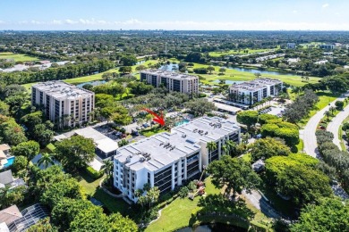 Breathtaking water views from this neutral highly sought after on Boca West Golf and Country Club in Florida - for sale on GolfHomes.com, golf home, golf lot