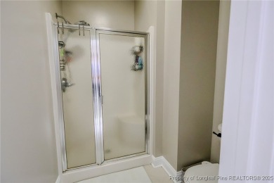 Welcome to this charming ranch home in the highly sought-after on Gates Four Golf and Country Club in North Carolina - for sale on GolfHomes.com, golf home, golf lot