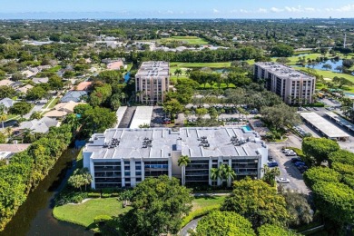 Breathtaking water views from this neutral highly sought after on Boca West Golf and Country Club in Florida - for sale on GolfHomes.com, golf home, golf lot