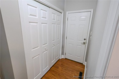 Welcome to this charming ranch home in the highly sought-after on Gates Four Golf and Country Club in North Carolina - for sale on GolfHomes.com, golf home, golf lot