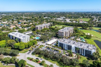 Breathtaking water views from this neutral highly sought after on Boca West Golf and Country Club in Florida - for sale on GolfHomes.com, golf home, golf lot