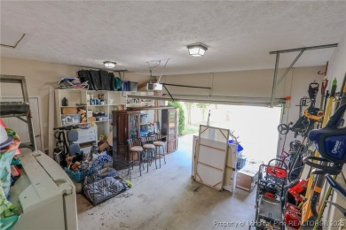 Welcome to this charming ranch home in the highly sought-after on Gates Four Golf and Country Club in North Carolina - for sale on GolfHomes.com, golf home, golf lot