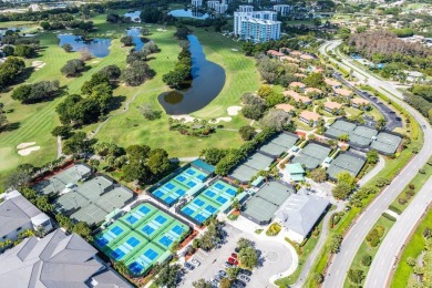 Breathtaking water views from this neutral highly sought after on Boca West Golf and Country Club in Florida - for sale on GolfHomes.com, golf home, golf lot