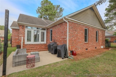 Welcome to this charming ranch home in the highly sought-after on Gates Four Golf and Country Club in North Carolina - for sale on GolfHomes.com, golf home, golf lot