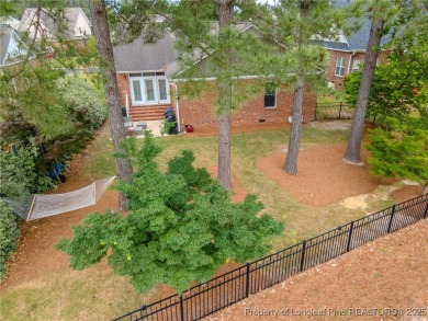 Welcome to this charming ranch home in the highly sought-after on Gates Four Golf and Country Club in North Carolina - for sale on GolfHomes.com, golf home, golf lot