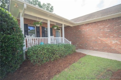 Welcome to this charming ranch home in the highly sought-after on Gates Four Golf and Country Club in North Carolina - for sale on GolfHomes.com, golf home, golf lot