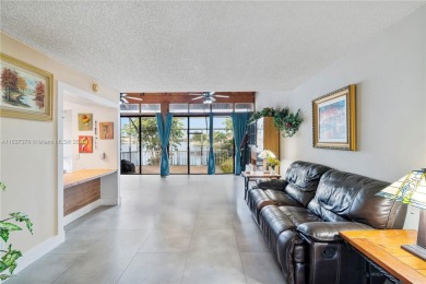 Enjoy breathtaking lakefront views  spectacular sunsets from on Pembroke Lakes Golf Club in Florida - for sale on GolfHomes.com, golf home, golf lot