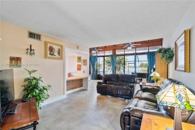 Enjoy breathtaking lakefront views  spectacular sunsets from on Pembroke Lakes Golf Club in Florida - for sale on GolfHomes.com, golf home, golf lot