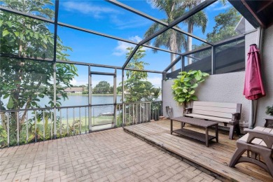 Enjoy breathtaking lakefront views  spectacular sunsets from on Pembroke Lakes Golf Club in Florida - for sale on GolfHomes.com, golf home, golf lot