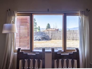 Discover unparalleled beauty and comfort in this exquisite on Taos Country Club in New Mexico - for sale on GolfHomes.com, golf home, golf lot
