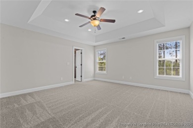 Welcome to 16 Quail Hollow-a beautifully maintained home tucked on Carolina Lakes Country Club in North Carolina - for sale on GolfHomes.com, golf home, golf lot