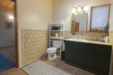 Discover unparalleled beauty and comfort in this exquisite on Taos Country Club in New Mexico - for sale on GolfHomes.com, golf home, golf lot