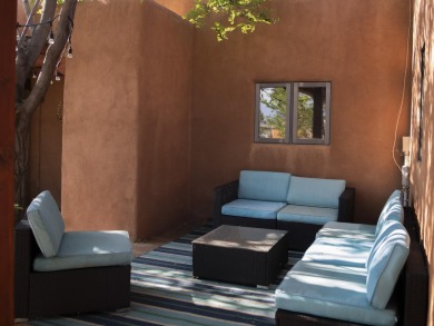 Discover unparalleled beauty and comfort in this exquisite on Taos Country Club in New Mexico - for sale on GolfHomes.com, golf home, golf lot