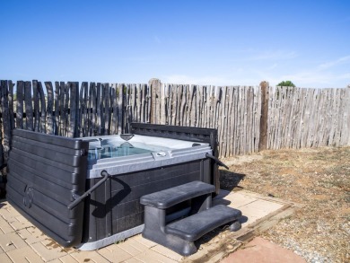 Discover unparalleled beauty and comfort in this exquisite on Taos Country Club in New Mexico - for sale on GolfHomes.com, golf home, golf lot