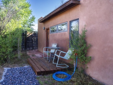 Discover unparalleled beauty and comfort in this exquisite on Taos Country Club in New Mexico - for sale on GolfHomes.com, golf home, golf lot