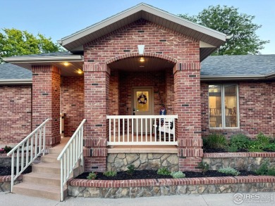Surrounded by 40 trees, and nestled in a spacious, desirable on Pawnee Pines Golf Club in Colorado - for sale on GolfHomes.com, golf home, golf lot