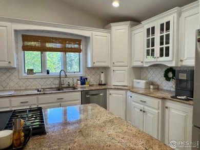 Surrounded by 40 trees, and nestled in a spacious, desirable on Pawnee Pines Golf Club in Colorado - for sale on GolfHomes.com, golf home, golf lot