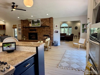 Surrounded by 40 trees, and nestled in a spacious, desirable on Pawnee Pines Golf Club in Colorado - for sale on GolfHomes.com, golf home, golf lot