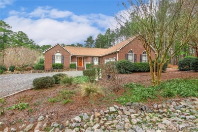 Charming all-brick home located in the gated and golf community on Carolina Trace Country Club in North Carolina - for sale on GolfHomes.com, golf home, golf lot