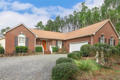 Charming all-brick home located in the gated and golf community on Carolina Trace Country Club in North Carolina - for sale on GolfHomes.com, golf home, golf lot