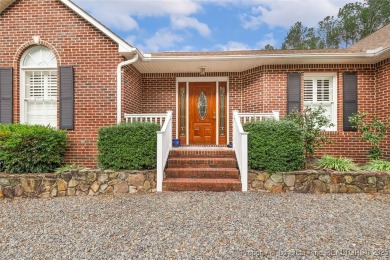 Charming all-brick home located in the gated and golf community on Carolina Trace Country Club in North Carolina - for sale on GolfHomes.com, golf home, golf lot