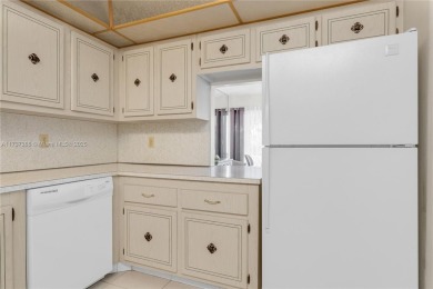 EXCELLENT LOCATION THIS LOVELY CONDO IS  READY TO MOVE IN * on The Diplomat Golf Resort and Spa in Florida - for sale on GolfHomes.com, golf home, golf lot