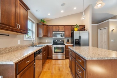 Welcome to this spacious 3-bedroom, 2-bath walkout home on on Bay Meadows Golf Course - Executive in Michigan - for sale on GolfHomes.com, golf home, golf lot