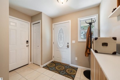 Welcome to this spacious 3-bedroom, 2-bath walkout home on on Bay Meadows Golf Course - Executive in Michigan - for sale on GolfHomes.com, golf home, golf lot