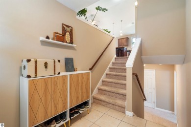 Welcome to this spacious 3-bedroom, 2-bath walkout home on on Bay Meadows Golf Course - Executive in Michigan - for sale on GolfHomes.com, golf home, golf lot