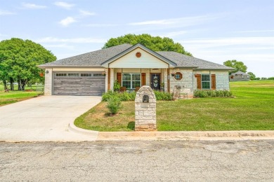 Beautifully set along the greens of the Par Golf Course, this on P.A.R. Country Club in Texas - for sale on GolfHomes.com, golf home, golf lot