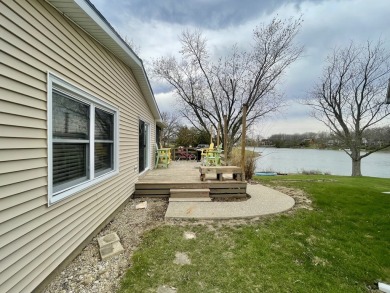 Experience the ultimate retreat in this captivating lakefront on Lakeview Country Club in Illinois - for sale on GolfHomes.com, golf home, golf lot