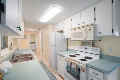 NEW PRICE!! NO HURRICANE DAMAGE OR FLOODING! EXTRAORDINARILY on Jacaranda West Country Club in Florida - for sale on GolfHomes.com, golf home, golf lot