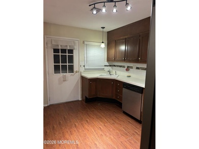 Quiet gated community with seven lakes, two swimming pools one on Greenbriar Woodlands in New Jersey - for sale on GolfHomes.com, golf home, golf lot