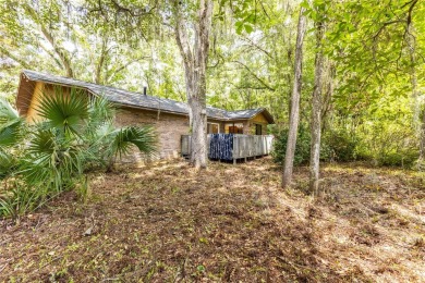 This charming and spacious residence sits on a large lot at the on Haile Plantation Golf and Country Club in Florida - for sale on GolfHomes.com, golf home, golf lot