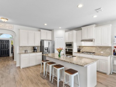 This meticulously cared for original-owner home features a POOL on The Golf Club At Champions Circle in Texas - for sale on GolfHomes.com, golf home, golf lot