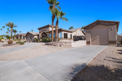 RV garage, side parking, 3+ car garage: this home has room for on London Bridge Golf Course in Arizona - for sale on GolfHomes.com, golf home, golf lot