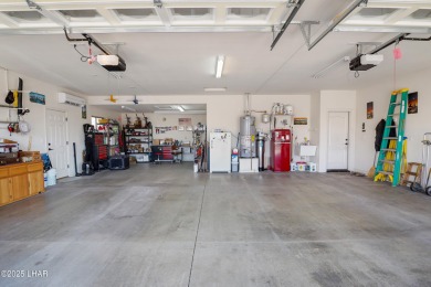 RV garage, side parking, 3+ car garage: this home has room for on London Bridge Golf Course in Arizona - for sale on GolfHomes.com, golf home, golf lot
