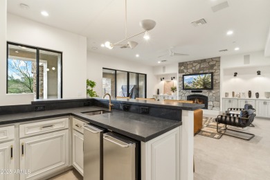 Tucked behind the gates of FireRock Country Club, this remodeled on FireRock Country Club in Arizona - for sale on GolfHomes.com, golf home, golf lot