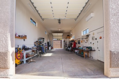 RV garage, side parking, 3+ car garage: this home has room for on London Bridge Golf Course in Arizona - for sale on GolfHomes.com, golf home, golf lot