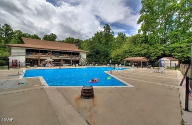 Situated right by the pool and within a short walk to the on Bent Creek Golf Course in Tennessee - for sale on GolfHomes.com, golf home, golf lot