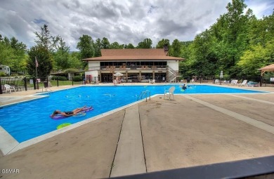 Situated right by the pool and within a short walk to the on Bent Creek Golf Course in Tennessee - for sale on GolfHomes.com, golf home, golf lot