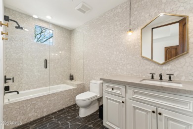 Tucked behind the gates of FireRock Country Club, this remodeled on FireRock Country Club in Arizona - for sale on GolfHomes.com, golf home, golf lot
