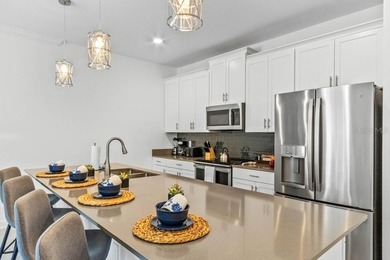 Unlock the door to luxury resort living and Central Florida on The Oasis Club at Champions Gate in Florida - for sale on GolfHomes.com, golf home, golf lot