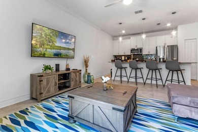 Unlock the door to luxury resort living and Central Florida on The Oasis Club at Champions Gate in Florida - for sale on GolfHomes.com, golf home, golf lot