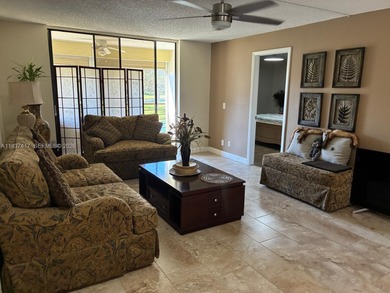 Elevated living meets total convenience in this charming on Sunrise Lakes Phase IV Golf Course in Florida - for sale on GolfHomes.com, golf home, golf lot